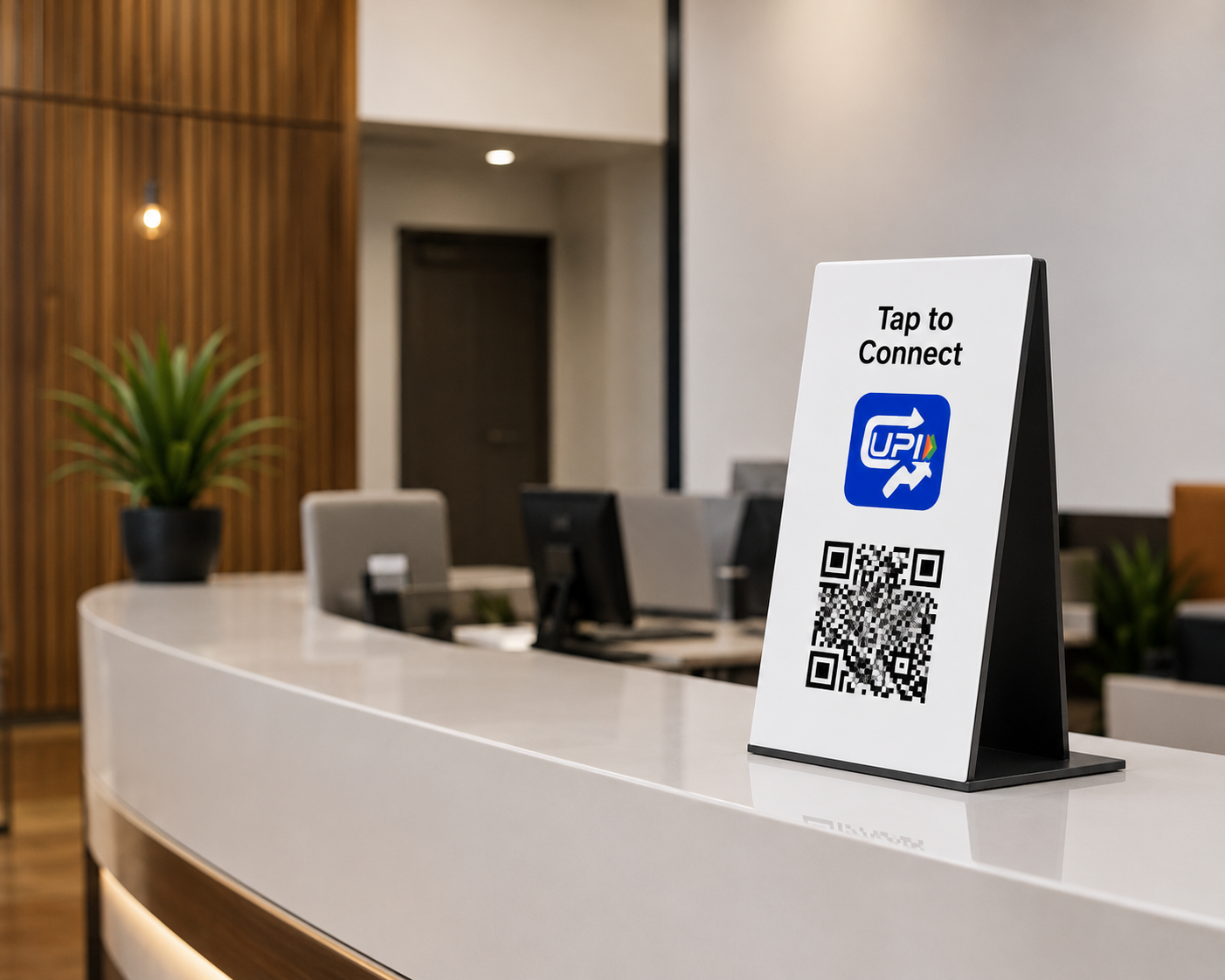 TapBudi smart display at a front desk
